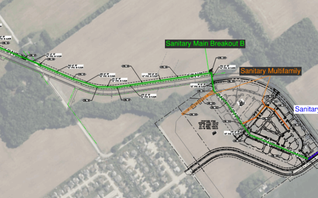 Aerial map showing blue, green, and orange sanitary main routes.